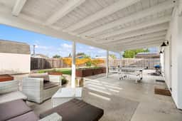 Surf Farmhouse | Hot Tub, Big Backyard, Sleeps 7!