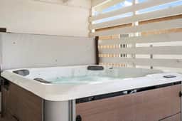Surf Farmhouse | Hot Tub, Big Backyard, Sleeps 7!