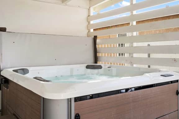 Surf Farmhouse | Hot Tub, Big Backyard, Sleeps 7!